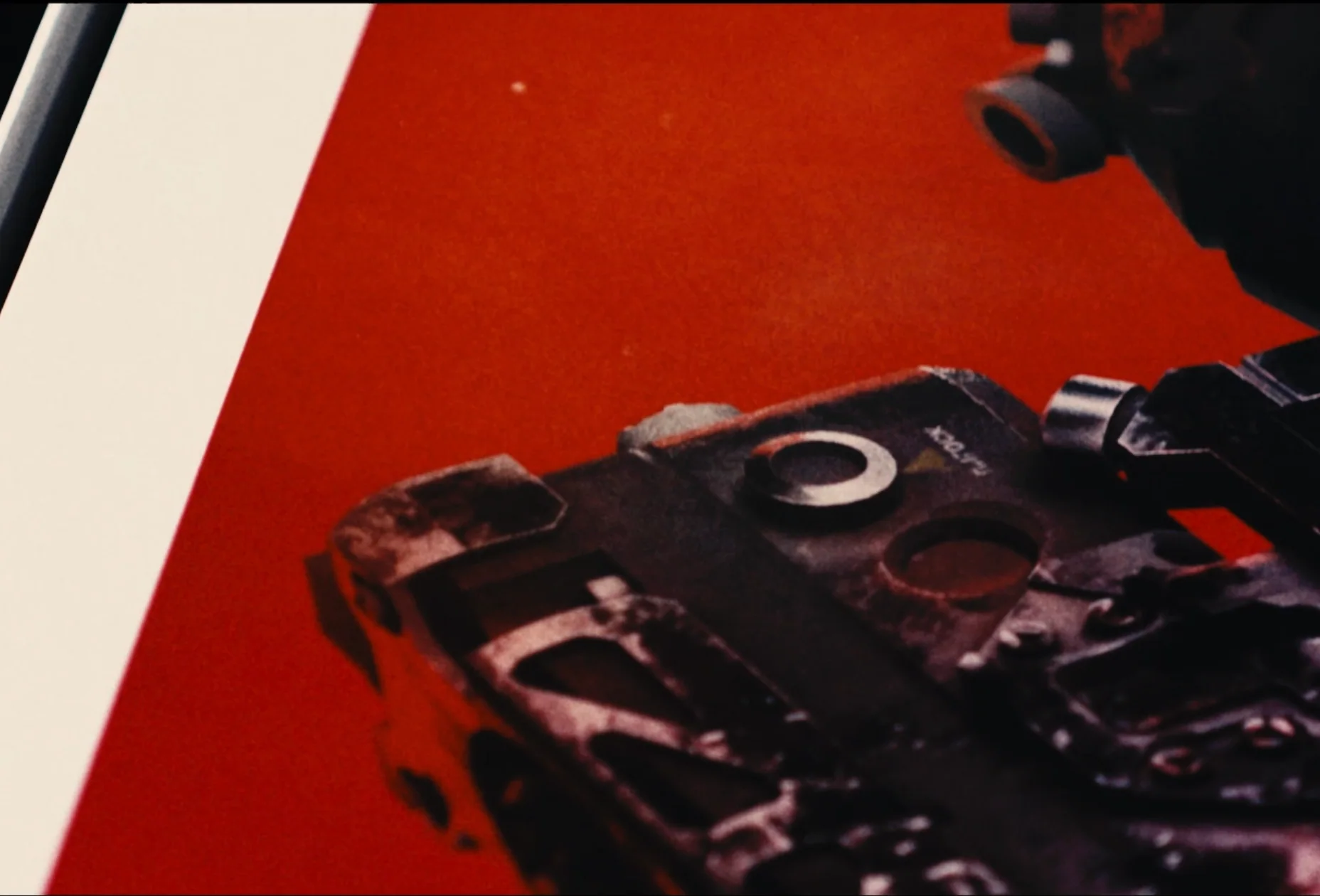 Red GTFO print with its white paper border visible