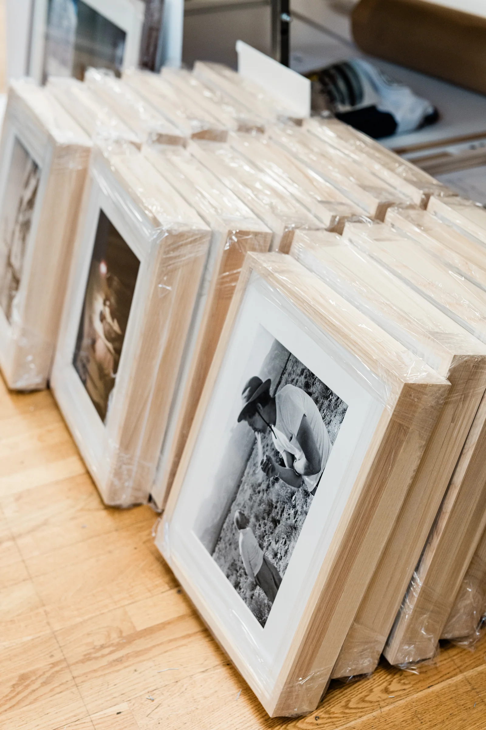 Finished framed photographs protected and ready for delivery